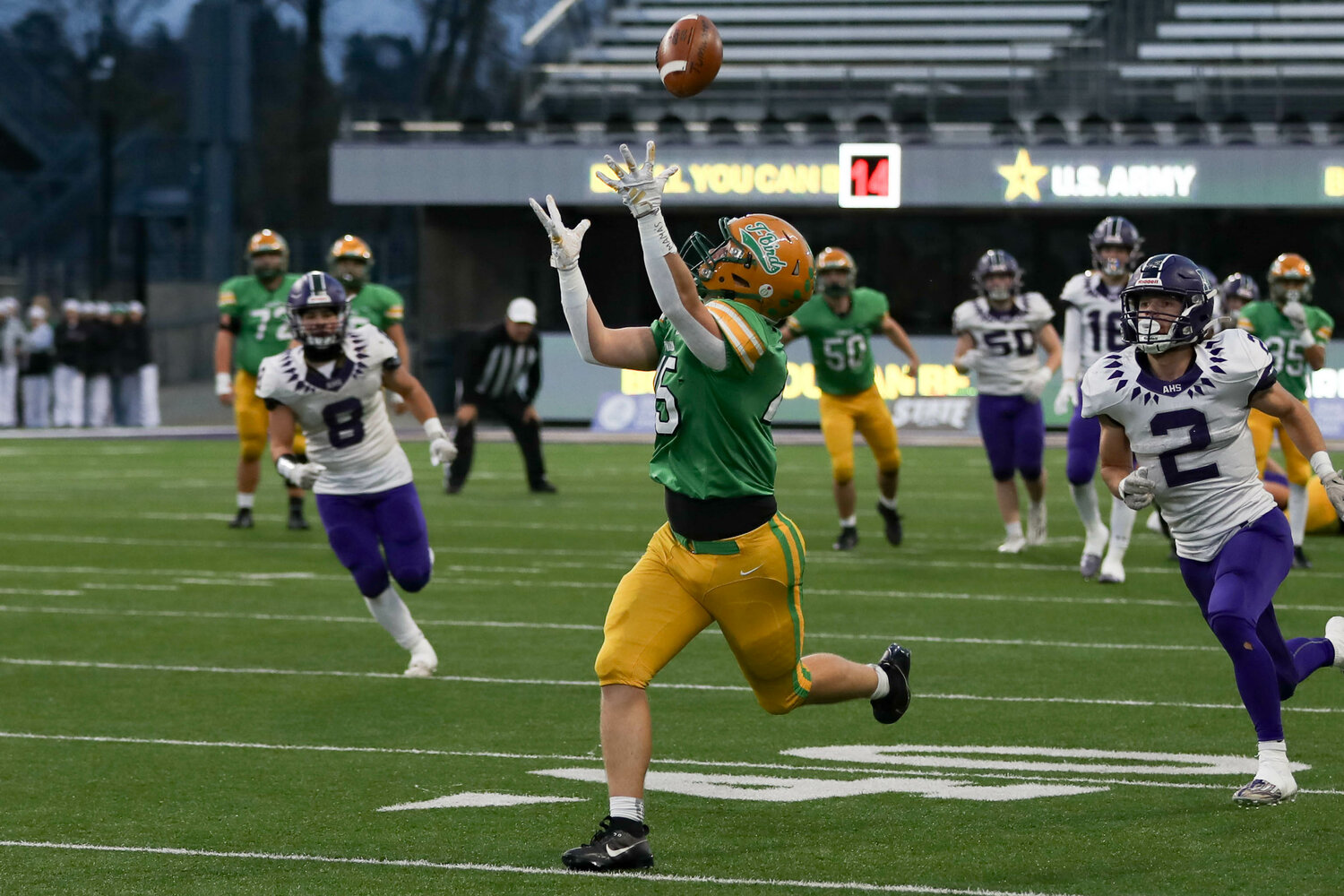 Tumwater's Jacob Dillon attempts to make a catch  during a 60-30 loss to Anacortes Dec. 2. at Husky Stadium.